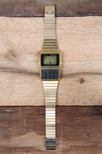 databank calculator watch, gold
