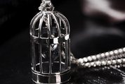 stolen girlfriends club heart in a cage necklace