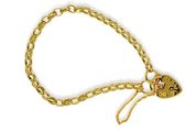 9k yellow gold oval link bracelet with heart locket